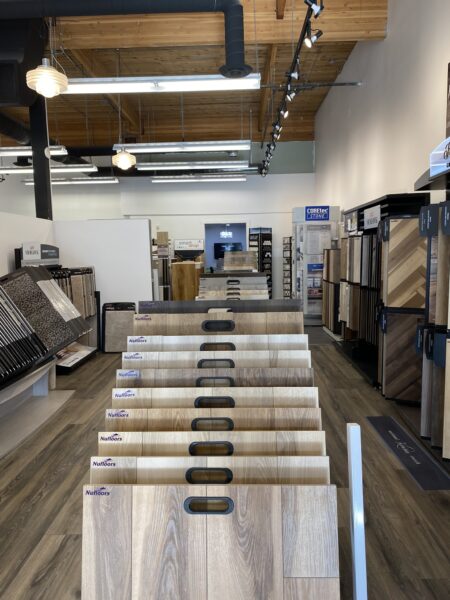 Sample displays from various flooring brands featured at Nufloors Kamloops
