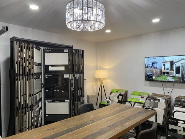 A consultation desk in the tile section at Nufloors Kamloops, with sample displays from the Ceramzone Collection, Julian Tile and TierraSol
