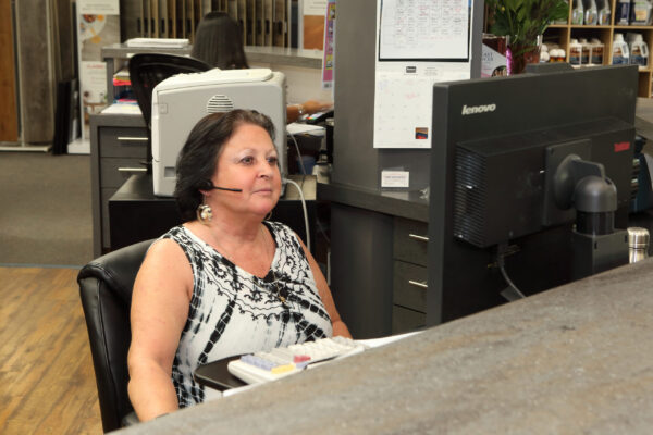 Nufloors Kelowna Team Member in Office