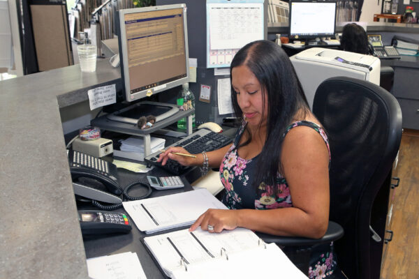 Nufloors Kelowna Team Member in Office