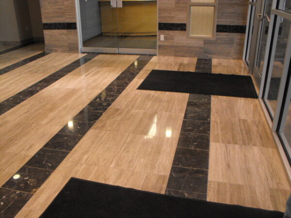Light and Dark brown wooden textured tiles on the floor.