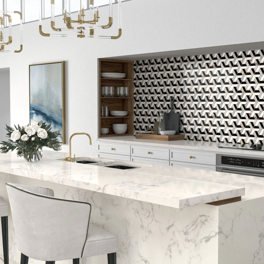 a strong geometric tile pattern in a kitchen with a white and grey marbled countertop