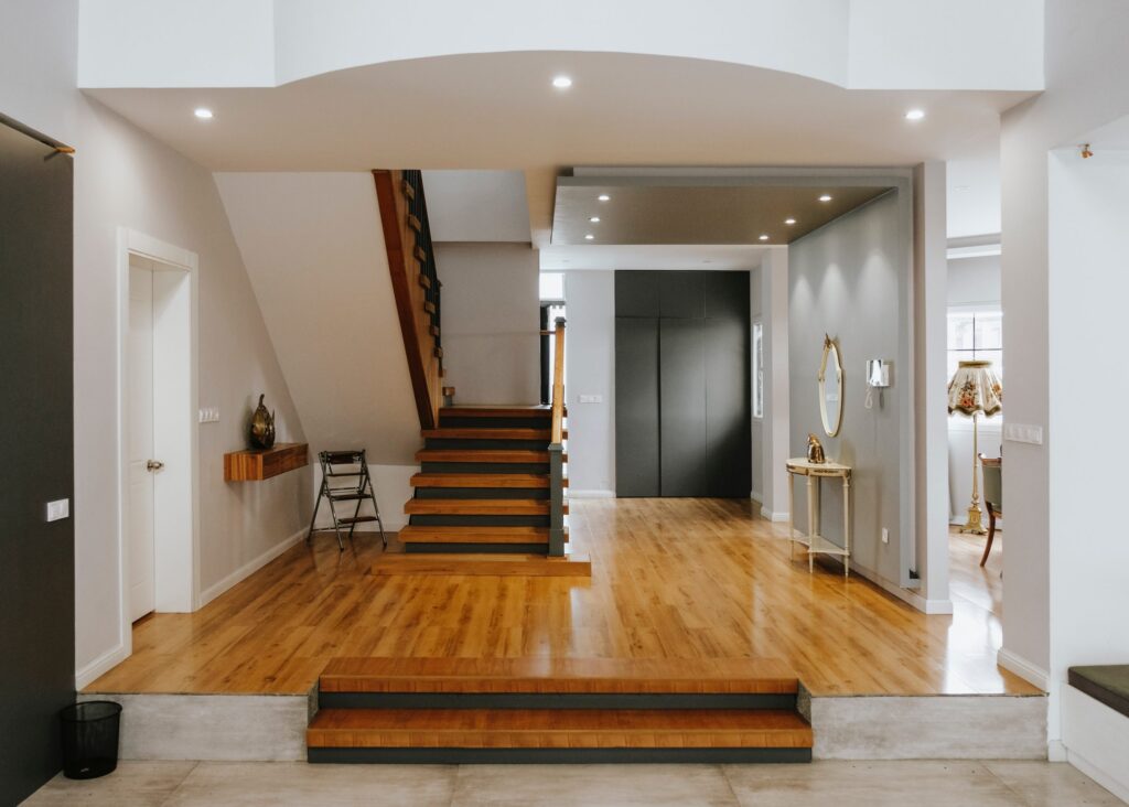 Brown hardwood flooring in an entryway in a modern home