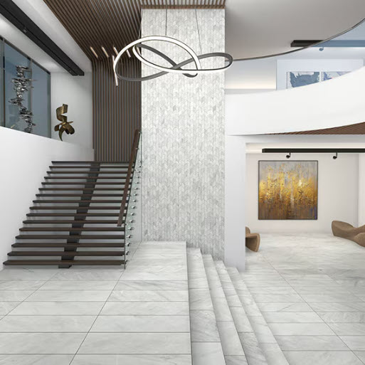 A modern livingroom and stairway in natural stone by Daltile