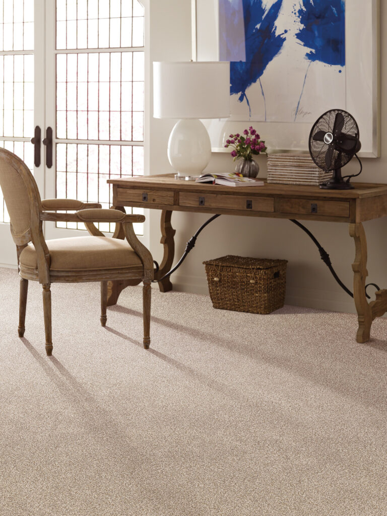 Caress Collection carpets shown in a bright home office with a wood desk and chair
