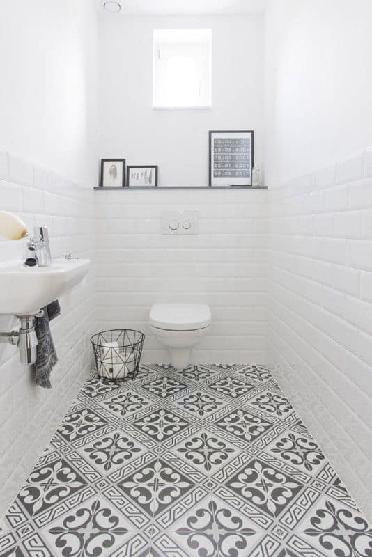 White wall tile with white grout in bright bathroom