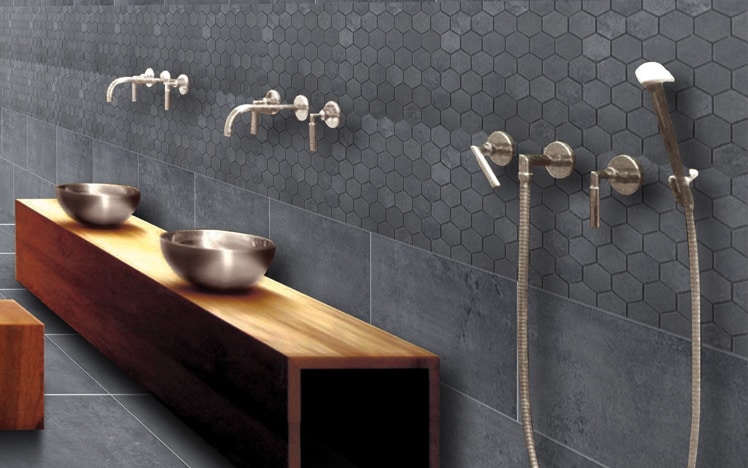 Grey hexagonal tiles in a bathroom.
