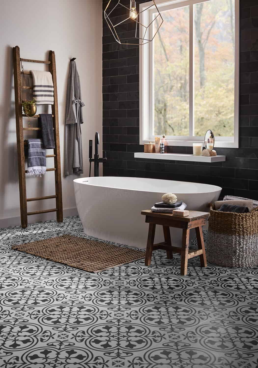 Bathroom wall accented with a dark hued tile