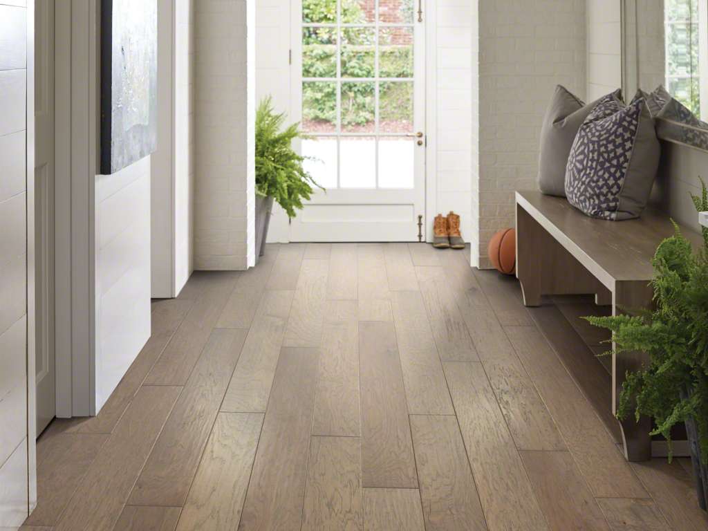 Open entryway with stylish bench