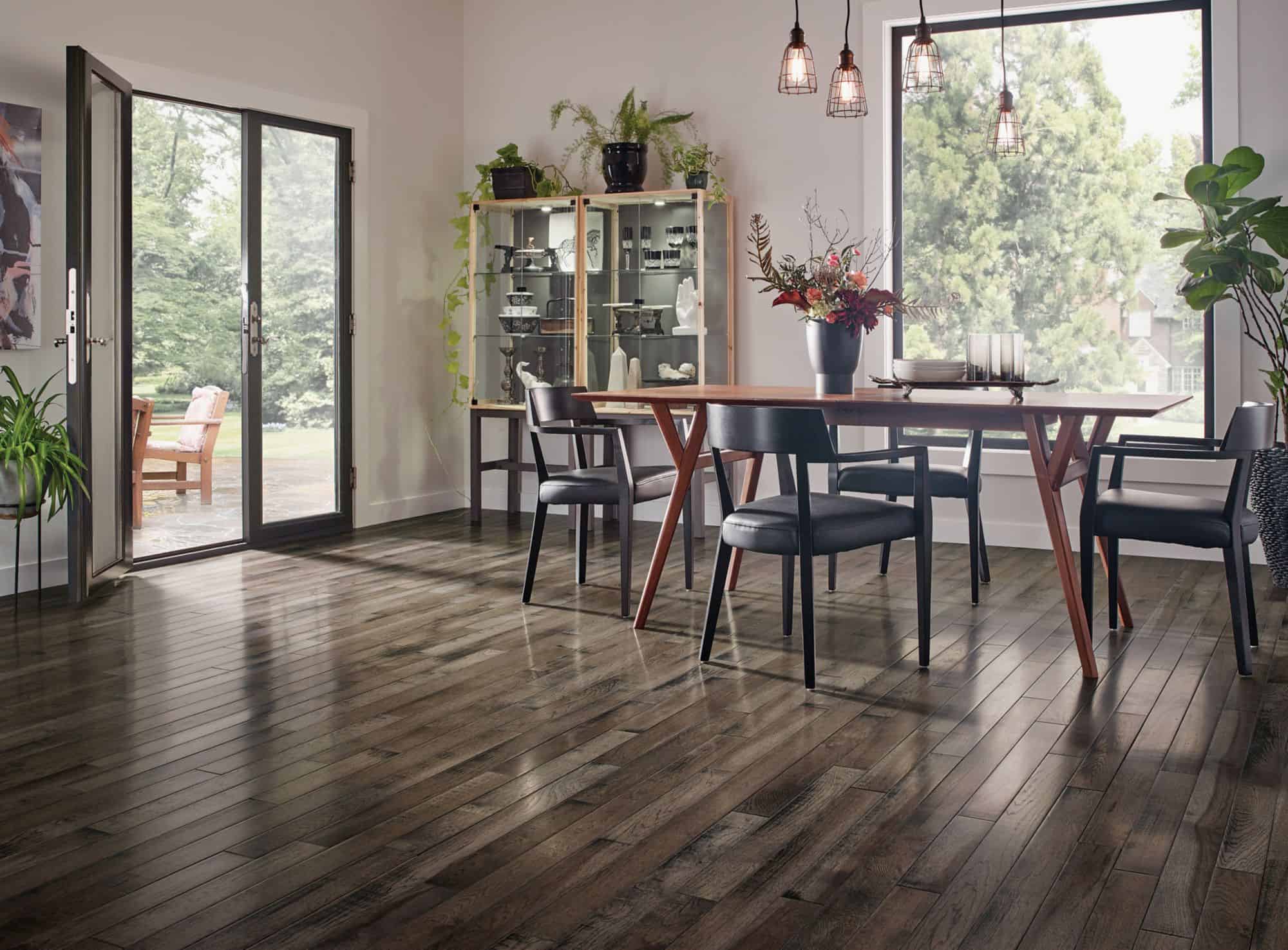 Freshly cleaned dark hardwood floor in a dinning room