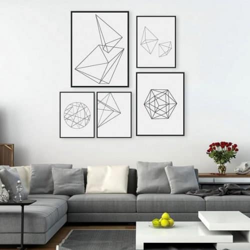 Living room with geometrical wall art collage.  