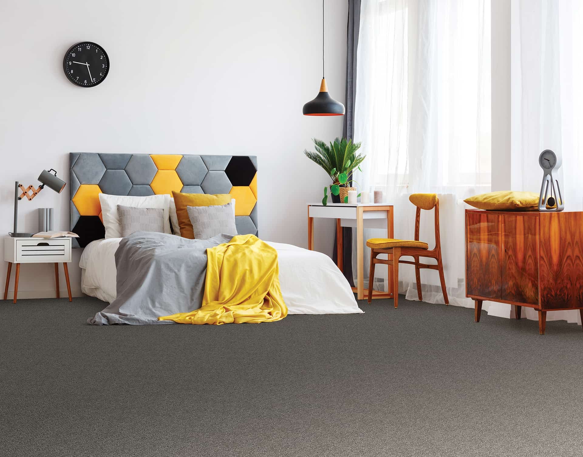 Grey Carpet in a modern bedroom with yellow accents