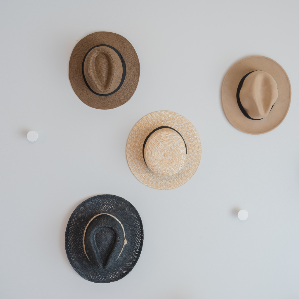Hats on hooks at entryway