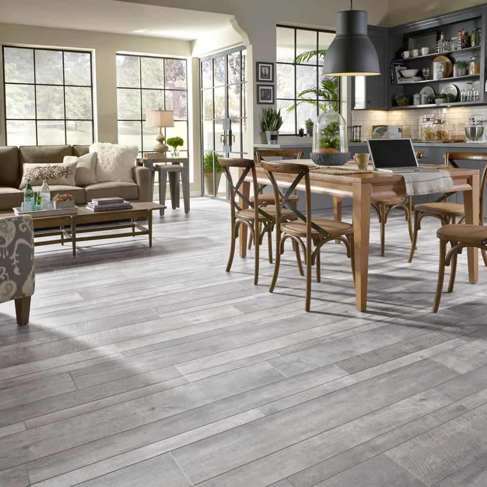 Keystone Oak Steel Flooring in open concept living, dining, kitchen; highlighting 2020 flooring trends.