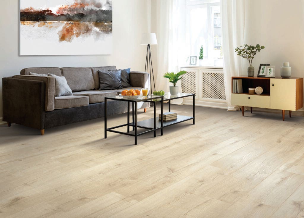 Black table on light wood flooring in spacious living room interior