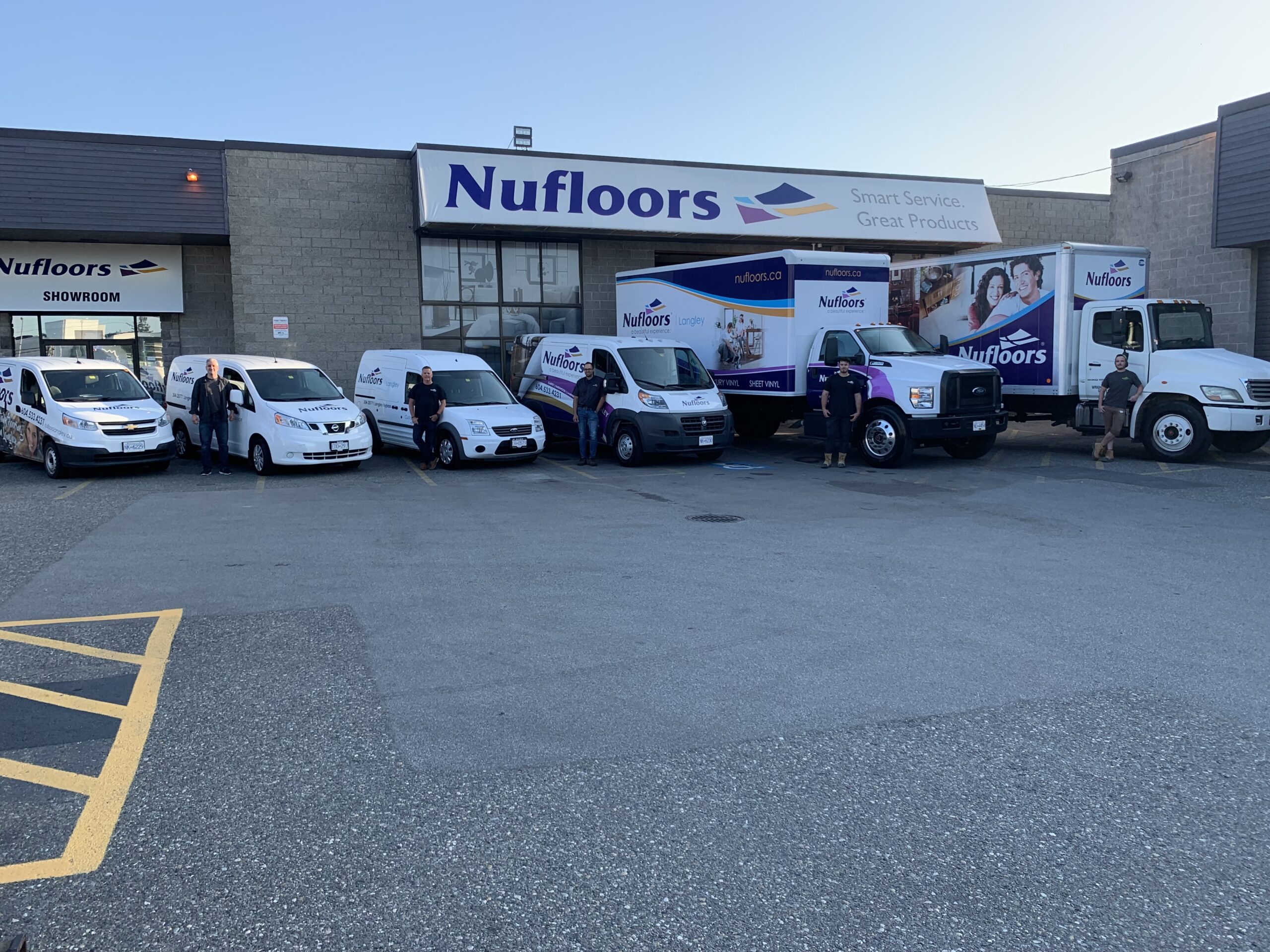Nufloors Langley fleet parked outside of the Langley store