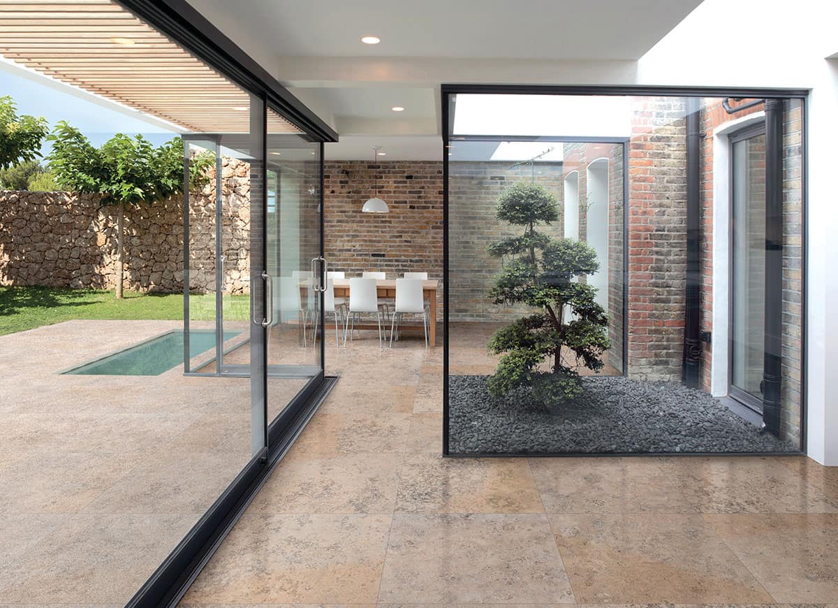 Porcelain Tile flooring in indoor/outdoor sunroom