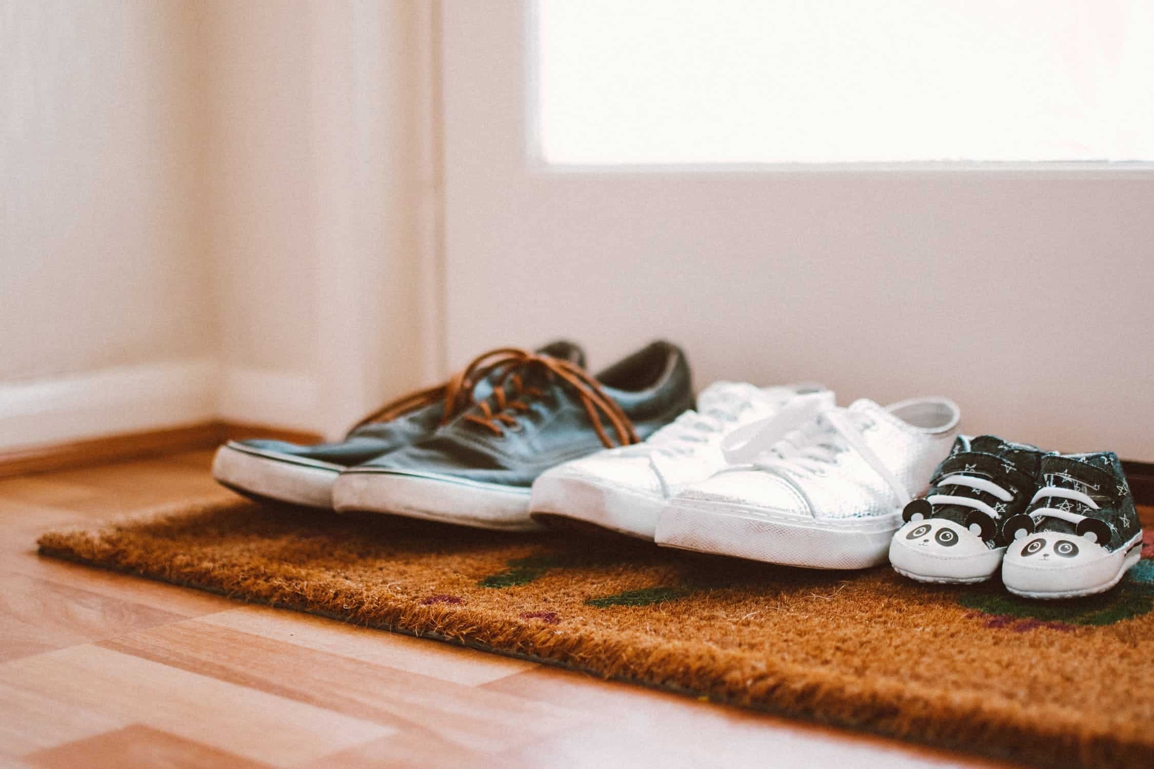 Shoes on Doormat; relating to keeping clean floors in winter.