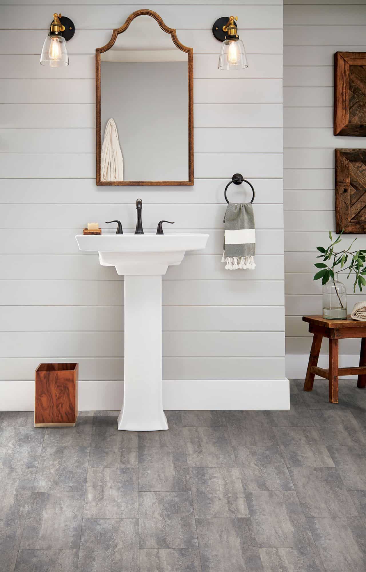 Luxury Vinyl Tile in Bathroom with white shiplap walls.