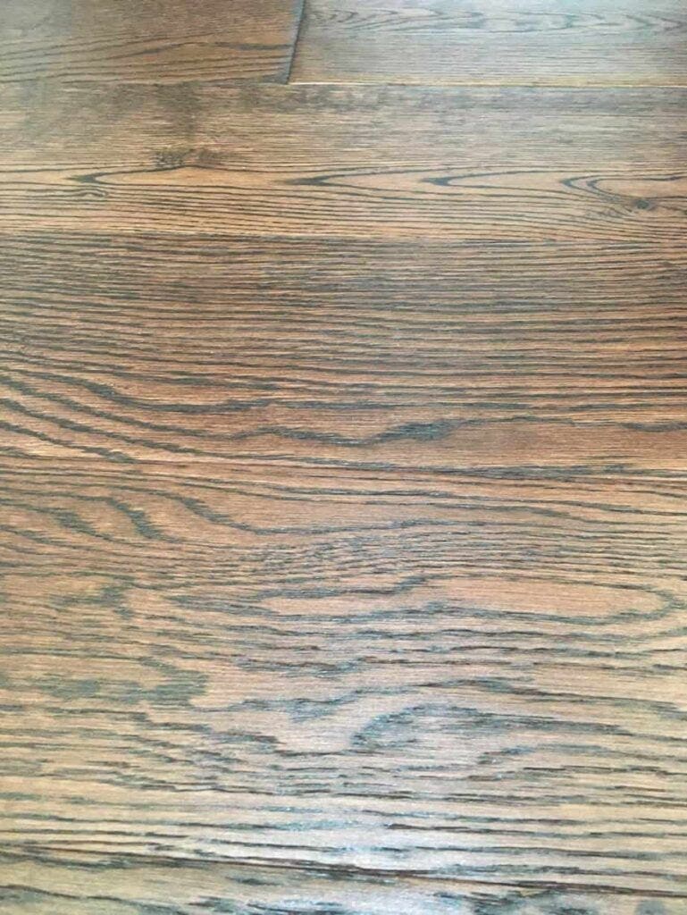 Closeup of grainy wirebrushed hardwood texture